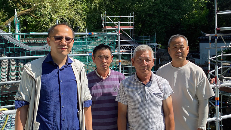 Hu Xiaojun und sein Team von Gartenbauexperten